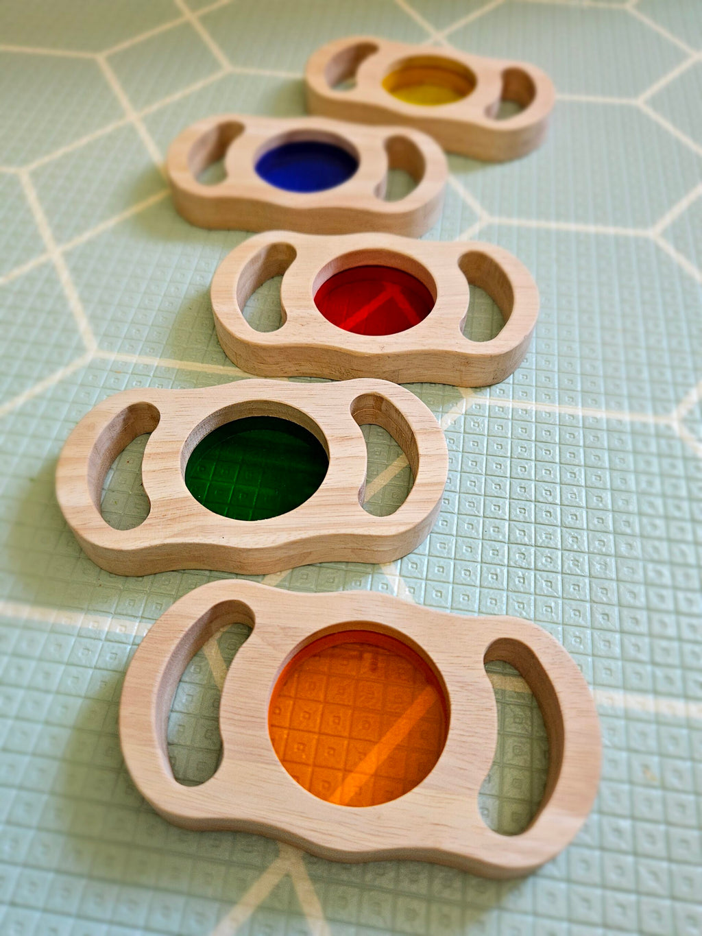 See through coloured blocks with handles
