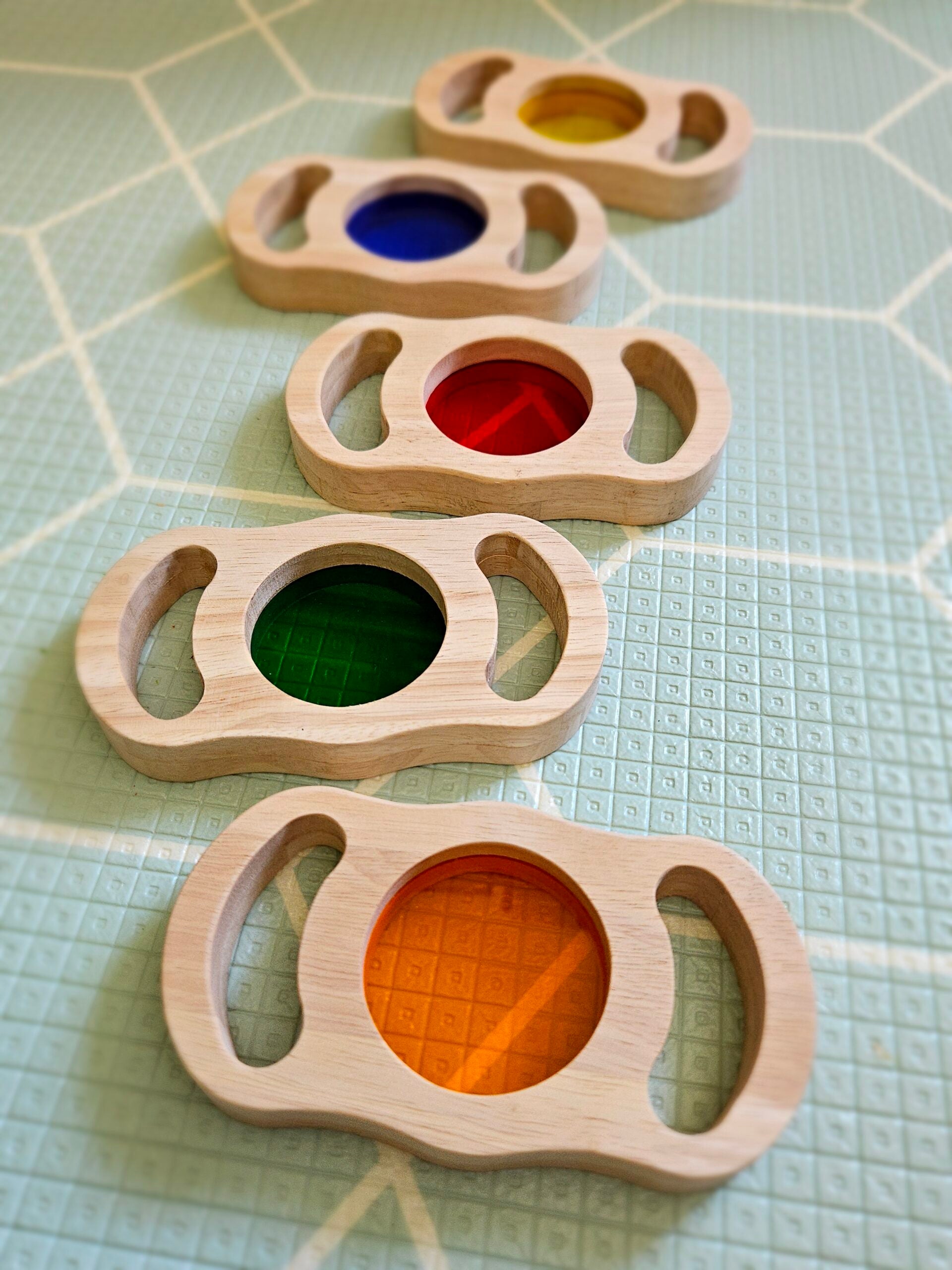 See through coloured blocks with handles