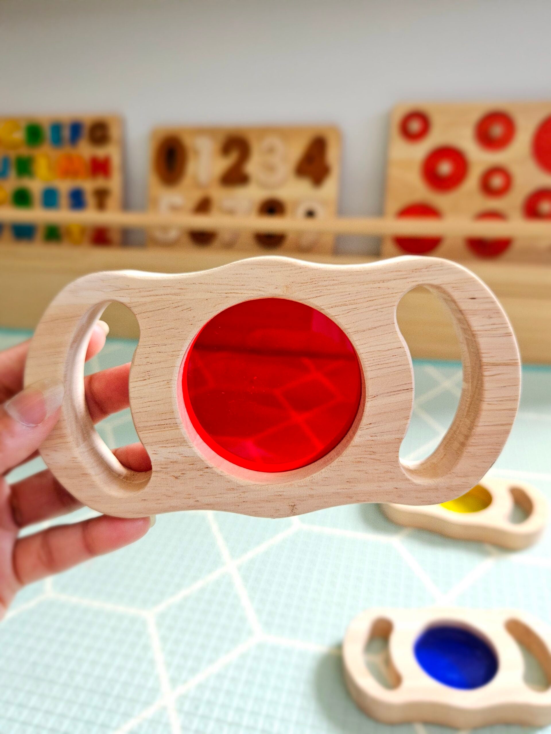 See through coloured blocks with handles