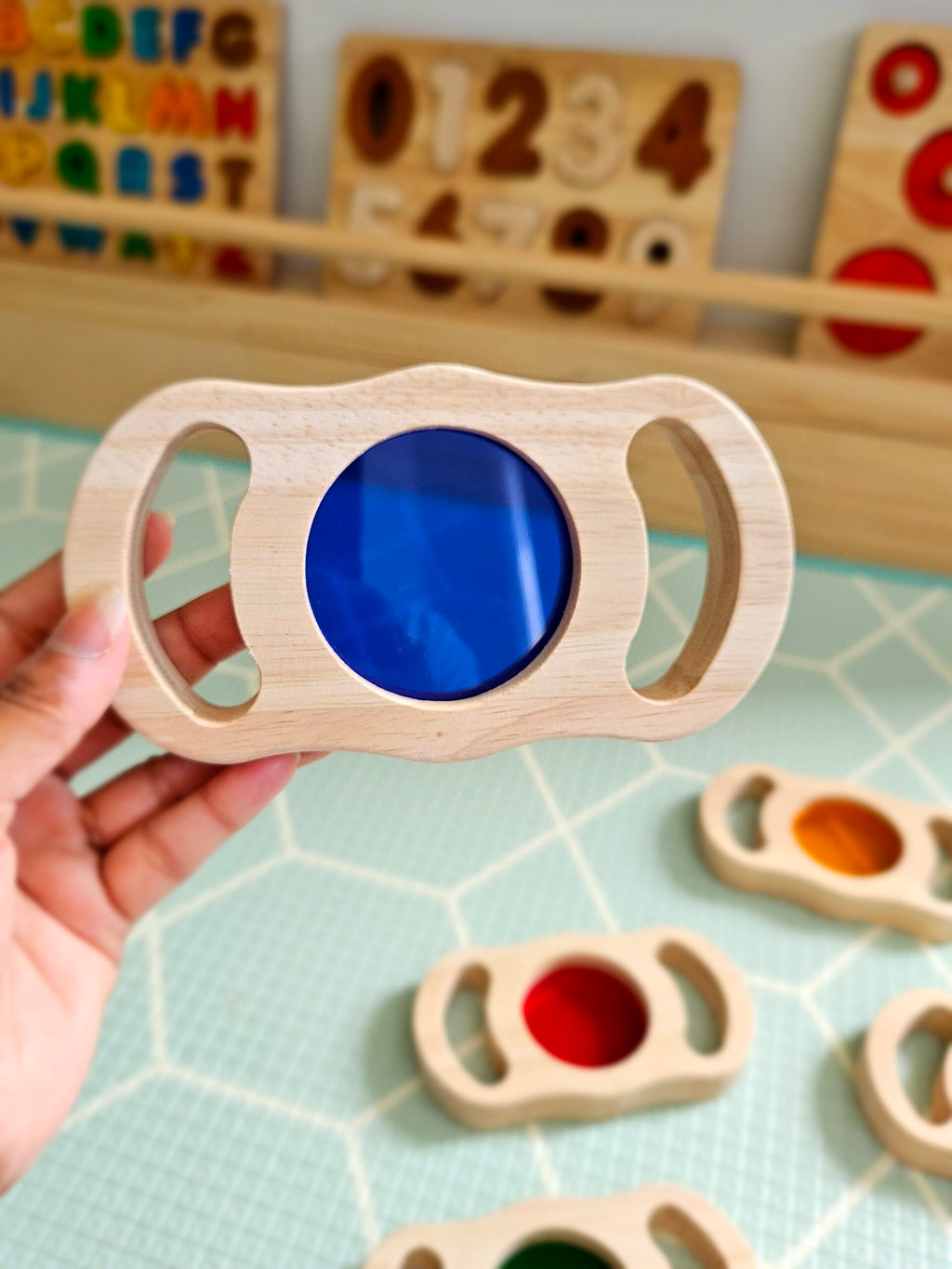 See through coloured blocks with handles