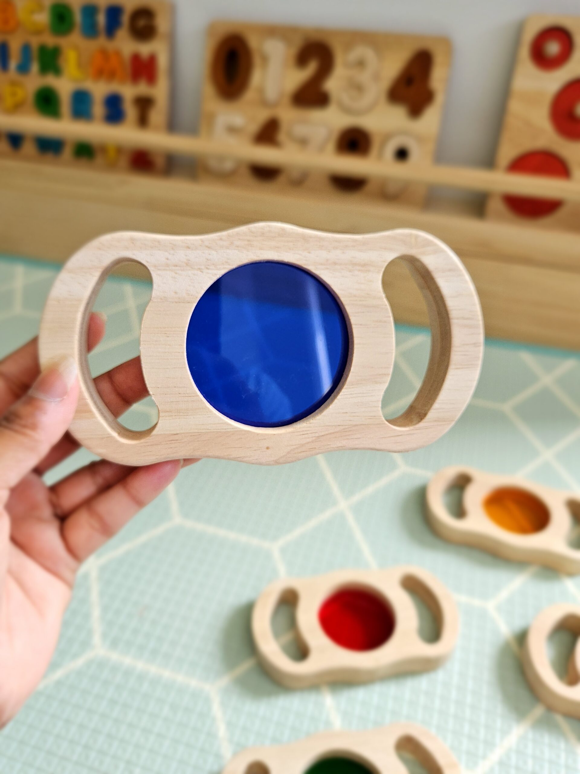 See through coloured blocks with handles