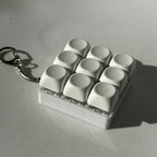 2-Pack White Mechanical 9-Keyboard Fingertip Toy Keychain - Key Pressure Relief, PVC Fingertip Toy